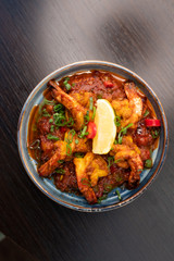 Indian food - chilli chicken with herbs and spices 