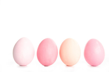 Easter eggs on a white background, place for text, top view, isolation, four