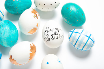 Easter eggs on a white background, place for text, top view, isolation,