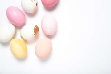 Easter eggs on a white background, place for text, top view, isolation,