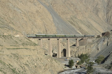 A train passed Jingtieshan railway station of Lanzhou Railway Bureau.