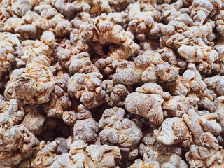 Dried root vegetables as a background