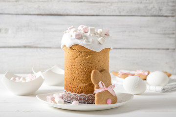 Easter cake on a white wooden background, Easter eggs, Easter cookies