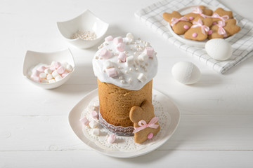 Easter cake on a white wooden background, Easter eggs, Easter cookies