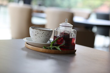 cheese cake next to herbal tea