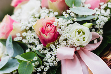 pink flowers in a wedding bouquet