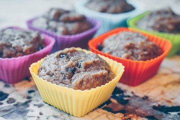 Healthy muffins in colored silicon cups