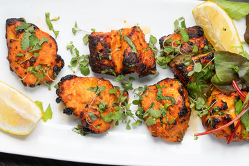 Indian food  - chicken tikka with herbs