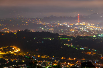 La Spezia seen from the hills on a night with full moon