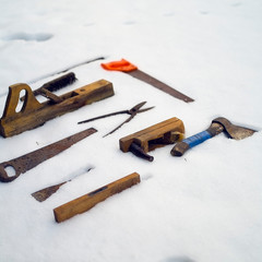 carpentry tools on the snow
