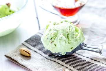 organic homemade ice cream in glass bowl on wooden background