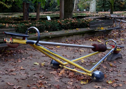 Childrens See Saw Playground Equipment In A Autumn Park 