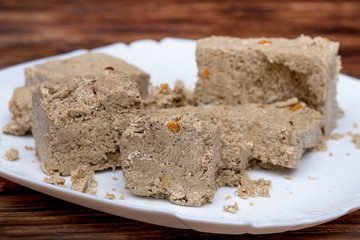 Halva in the billy tarіltsі on the dark wooden table_