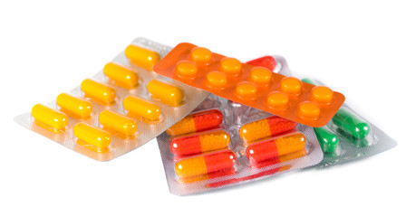 Ð¡olorful pills on white background.