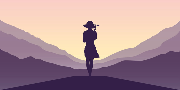 young girl at purple mountain landscape at sunset vector illustration EPS10 © krissikunterbunt