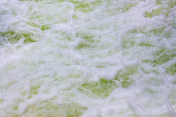 Stormy stream of water in a mountain river. Water texture_