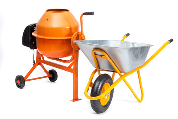Concrete mixer and cart on an isolated white background.