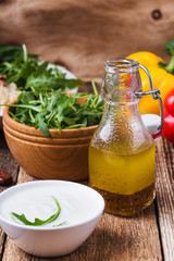 Greek yogurt and homemade salad dressing, preparing fresh salad