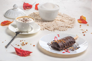 Autumn food still life in the style of a high key. Chocolate cake pops with nuts in form of...