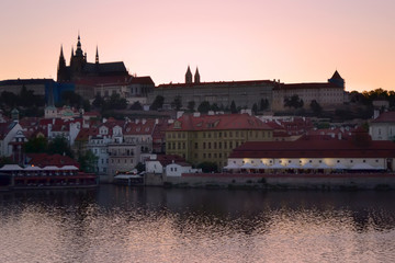 Evening landscape of the Vltava river and Prague Castle in Old Prague. Beautiful sunset.