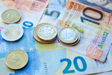 Euro and Pound banknotes and coins