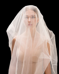 Fototapeta na wymiar Young woman in bra and white veil cropped shot