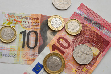 Euro and Pound banknotes and coins
