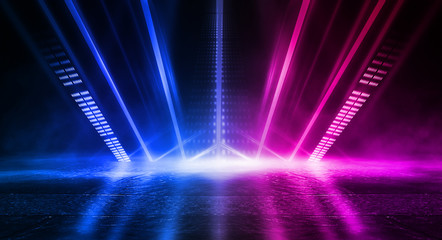 Fototapeta na wymiar Empty stage, blue and pink, purple neon, abstract background. Rays of searchlights, light, abstract tunnel, corridor. Dark futuristic background, smoke, smog.
