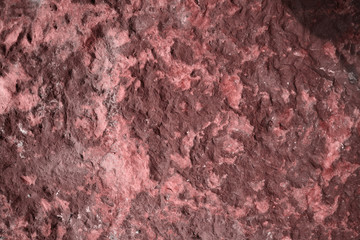 ancient gray magenta granite stone of cave for interior