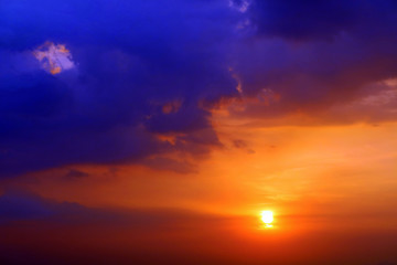 Fototapeta na wymiar purple orange yellow red silhouette sky in sunset back on the cloud