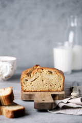 Banana sweet bread sliced on  wooden cutting board. Healthy Diet Breakfast Concept