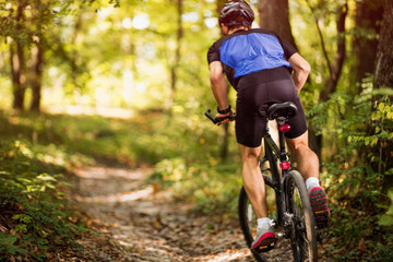 biking on a sunny day in the forest .Spring, nature ,sport concept