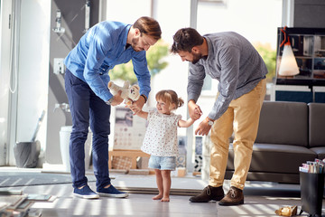 Happy family having fun at shopping..Child at shopping  with parents.