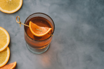 Aperol spritz cocktail with oranges and ice in wine glass. Summer refreshing drink