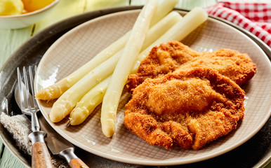 Gourmet appetizer with white asparagus tips