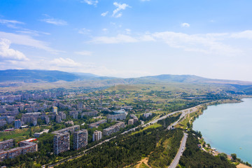 Fototapeta na wymiar panorama of the new district of Tbilisi and Tbilisi sea or Tbilisi reservoir landscape in Tbilisi, Georgia.