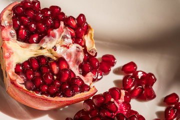 Macro shot of bright red pomegranate seeds