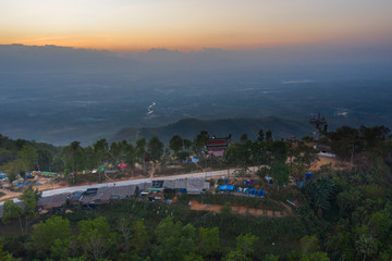 Fototapeta premium Khao Soon Sea Mist Sitting and watching the sea of ​​mist Watch the sunrise Breathe fresh air at the viewpoint of the center hill. Nakhon Si Thammarat