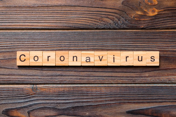 coronavirus word written on wood block. text on wooden table for your desing, Wuhan Coronavirus,...