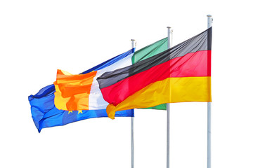 Waving flags on flagpoles isolated on white background. Flags of Germany, Ireland, European Union