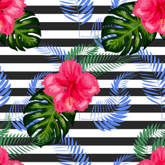 Tropical pattern. Tropical flowers and leaves for your design. Hibiscus, monstera leaf, palm leaves. Seamless pattern.