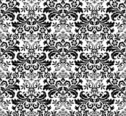 Wallpaper in the style of Baroque. Seamless vector background. White and black floral ornament. Graphic pattern for fabric, wallpaper, packaging. Ornate Damask flower ornament