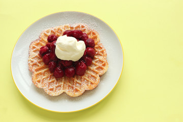 waffle with cherries and cream