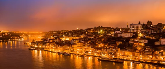 Foto op Plexiglas Panorama of old city Porto at sunset. © tbralnina