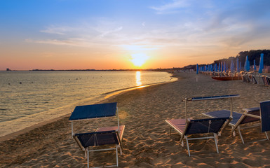 The most beautiful sandy beaches of Apulia.Salento coast: shoreline at sunset. Porto Cesareo beach....