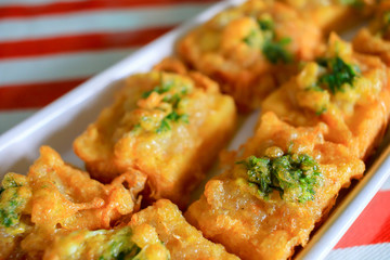 Thai popular food. Fried bread with minced shrimp spread.