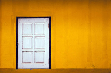 Yellow old wall With 1 door with copy space