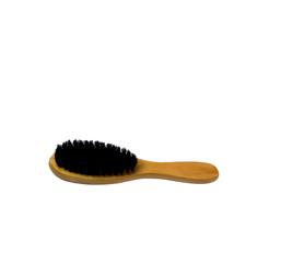 Hairbrush with natural black bristles on a white background. Hair accessory. Barber tool, isolate.