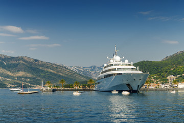 Fototapeta na wymiar Sunny view of luxury yacht at the port of Tivat, Montenegro.
