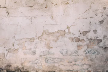 Crédence de cuisine en verre imprimé Vieux mur texturé sale Rough textured cement concrete  wall with varying shades of gray, brown and cream with peeling layers